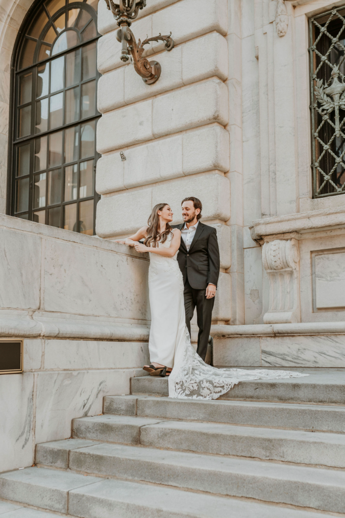 Post wedding portraits outside the Cleveland Public Library