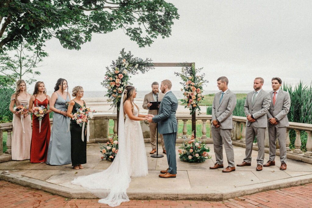 Coastal chic outdoor wedding ceremony at Eolia Mansion in Harkness State Park