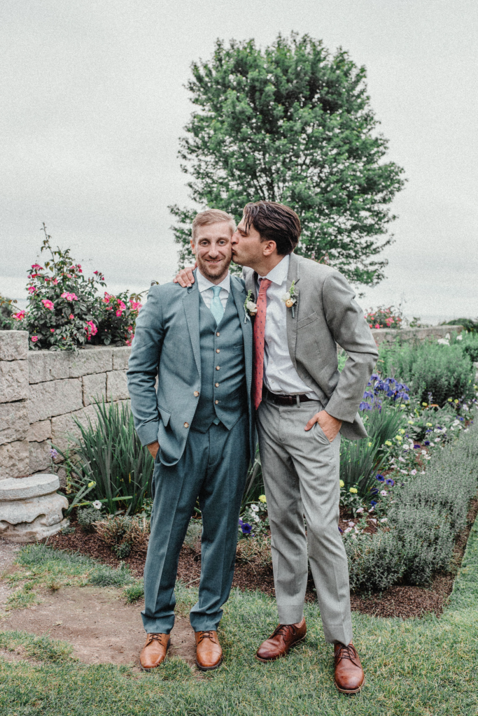 Groom with his best man in the Eolia gardens