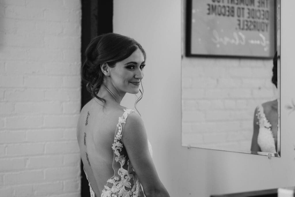 Black and white modern getting ready wedding portrait