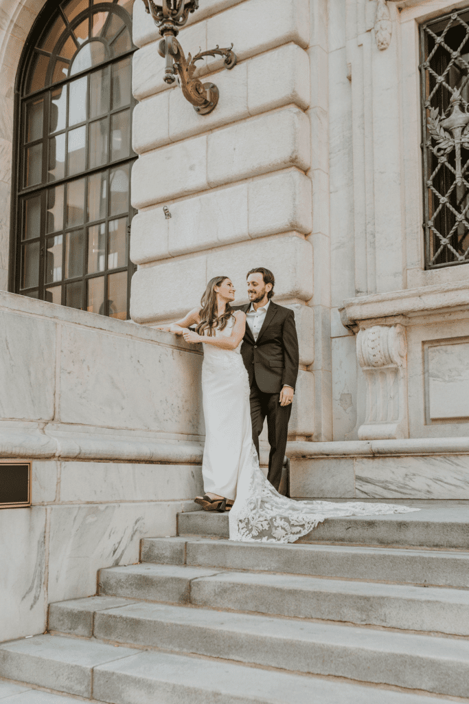 Post wedding portraits outside the Cleveland Public Library