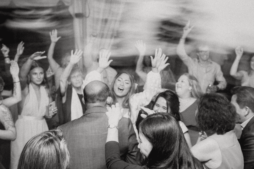 The couple partying the night away on the dance floor at their Eolia Mansion wedding