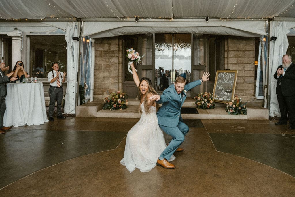 The couple dancing their way into the wedding reception
